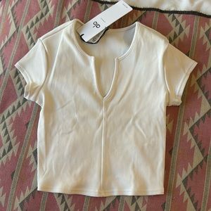 ALO Yoga Cream Ribbed Crop Top with Notch Neck
